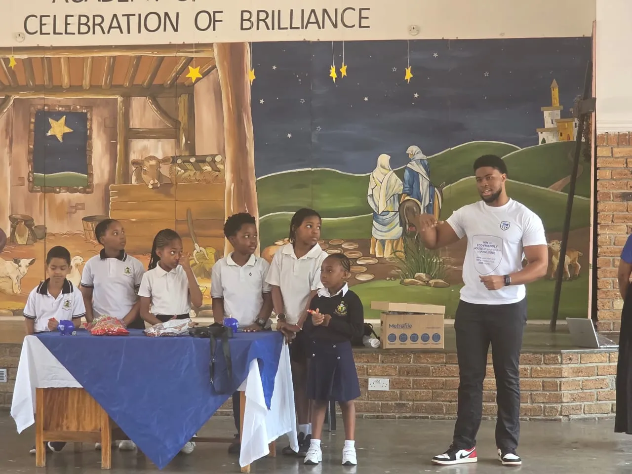 A workshop facilitator sharing practical knowledge with AOT students